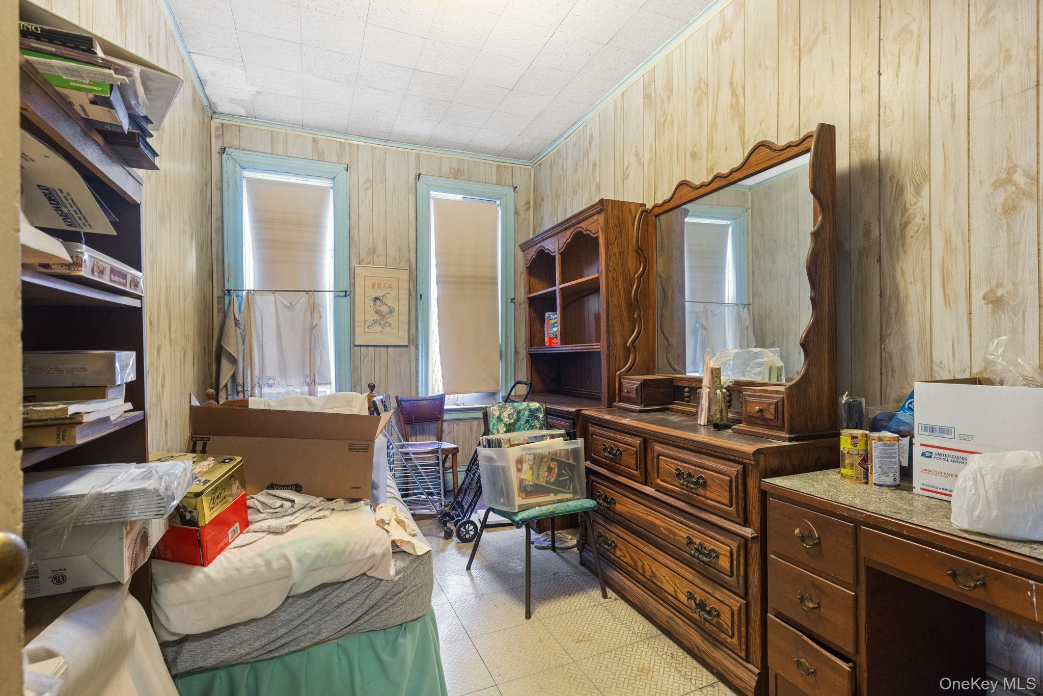 149 Dahill Road Brooklyn, NY 11218 - Photo 23 of 36 a bedroom with furniture and a window