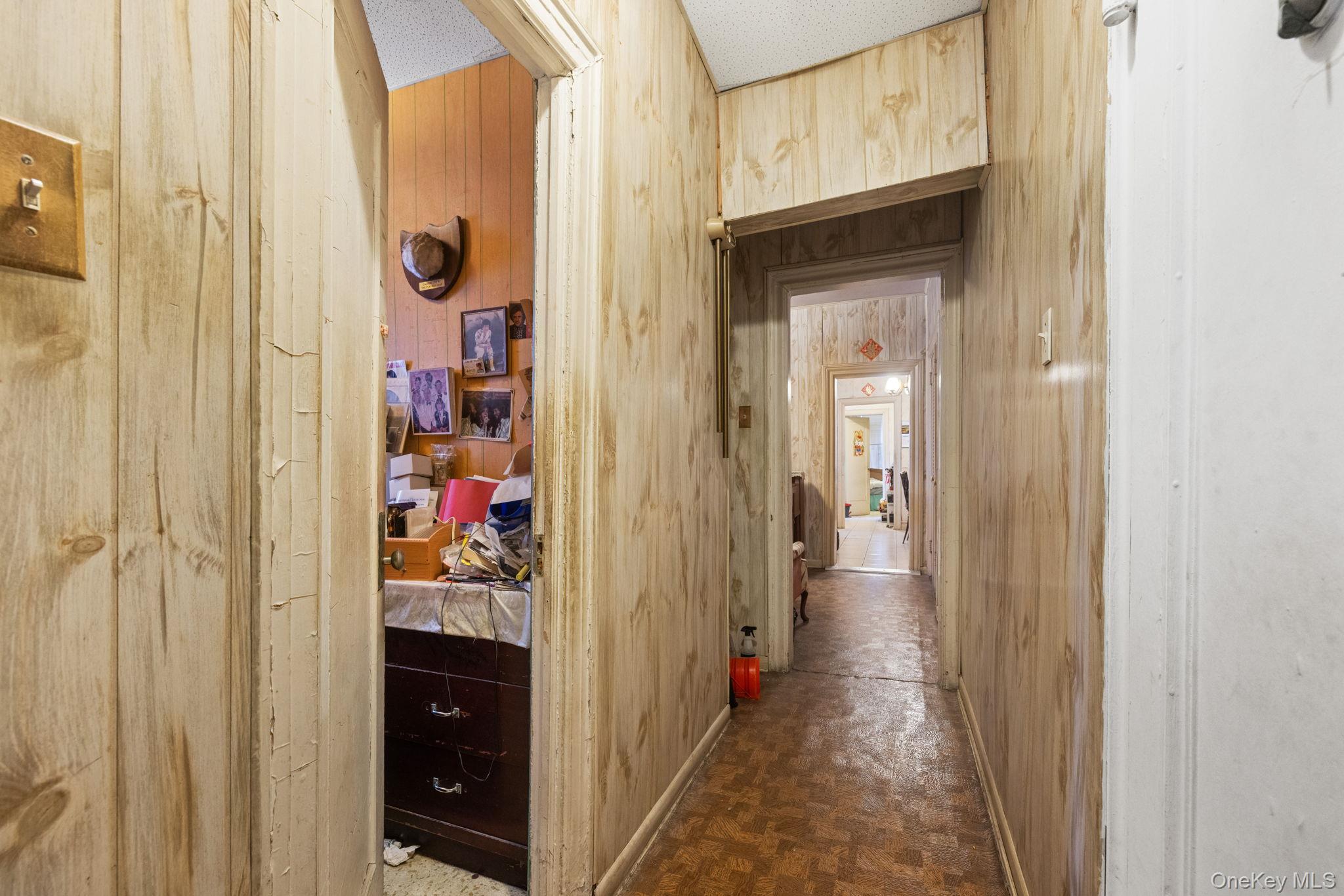 149 Dahill Road Brooklyn, NY 11218 - Photo 29 of 36 a view of a hallway with closet and a window