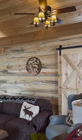 a view of a fireplace with furniture