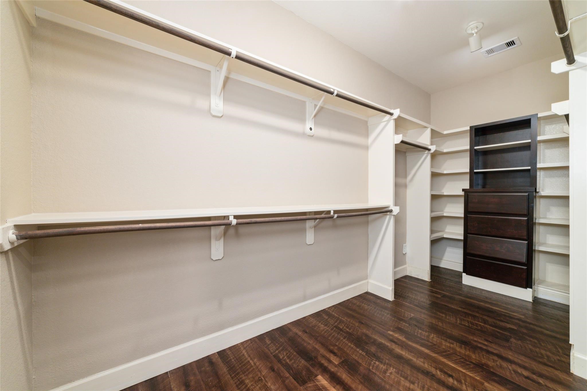 19022 Santa Elena Canyon Court Spring, TX 77388 - Photo 26 of 38 a view of walk in closet with empty racks