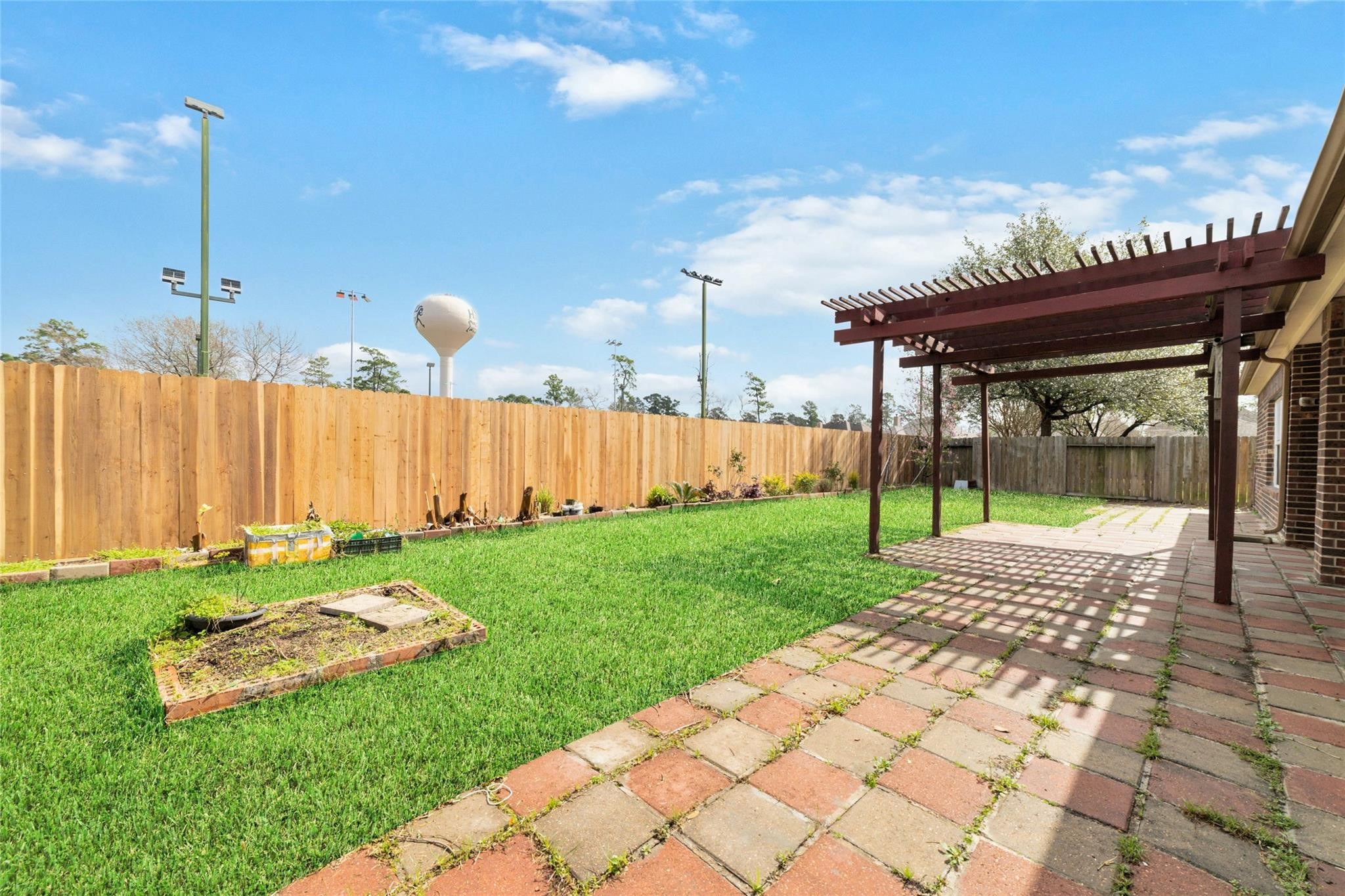 19022 Santa Elena Canyon Court Spring, TX 77388 - Photo 36 of 38 a view of a backyard with sitting area
