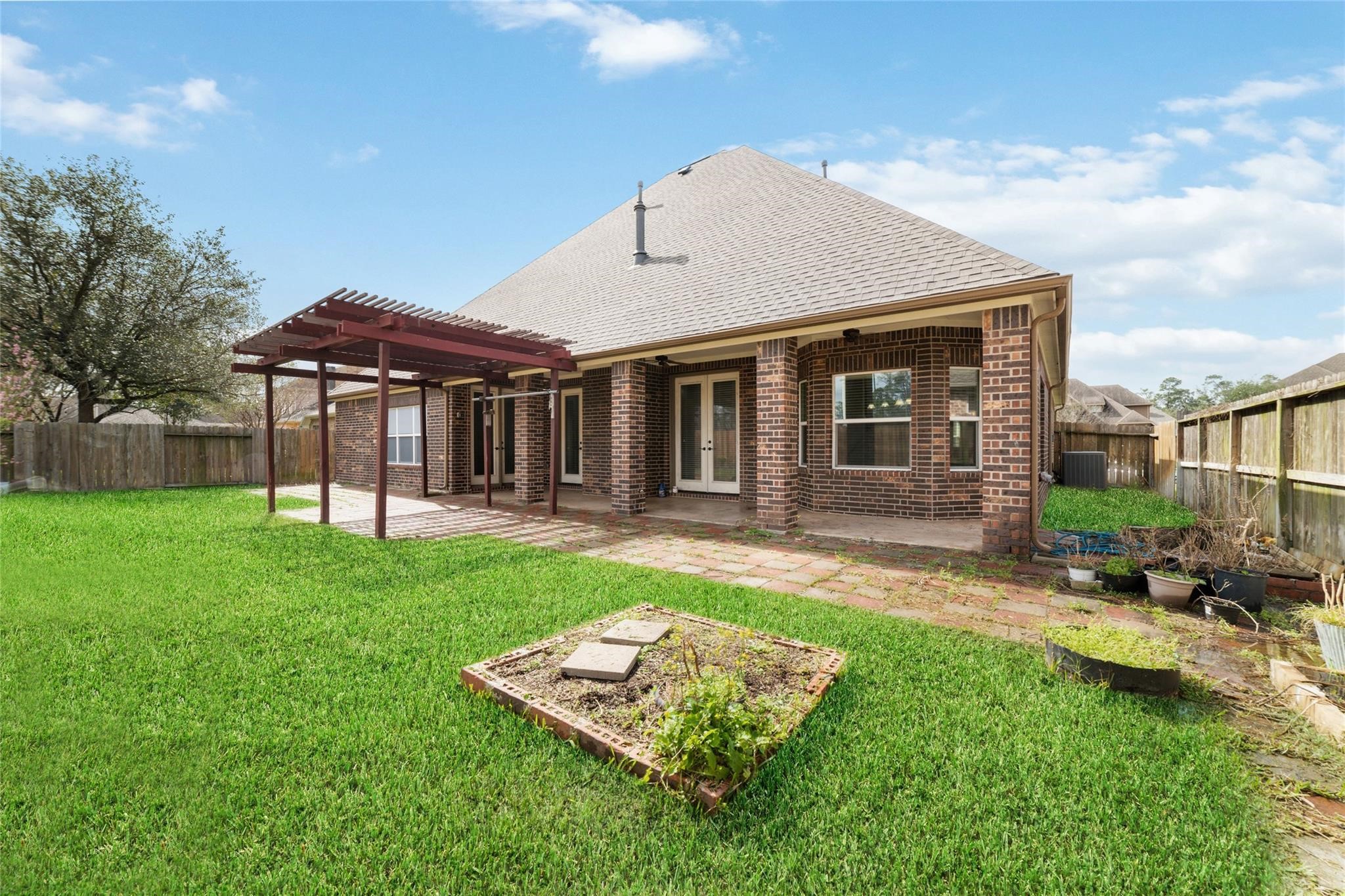 19022 Santa Elena Canyon Court Spring, TX 77388 - Photo 37 of 38 a front view of a house with garden