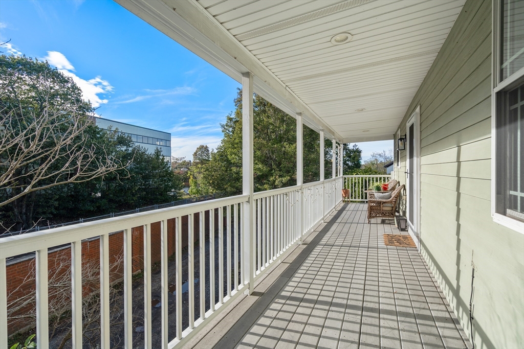 62 Redfield Street, Unit 62 Boston, MA 02122 - Photo 25 of 30 a view of balcony with wooden floor and fence