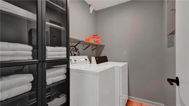 a utility room with dryer and washer