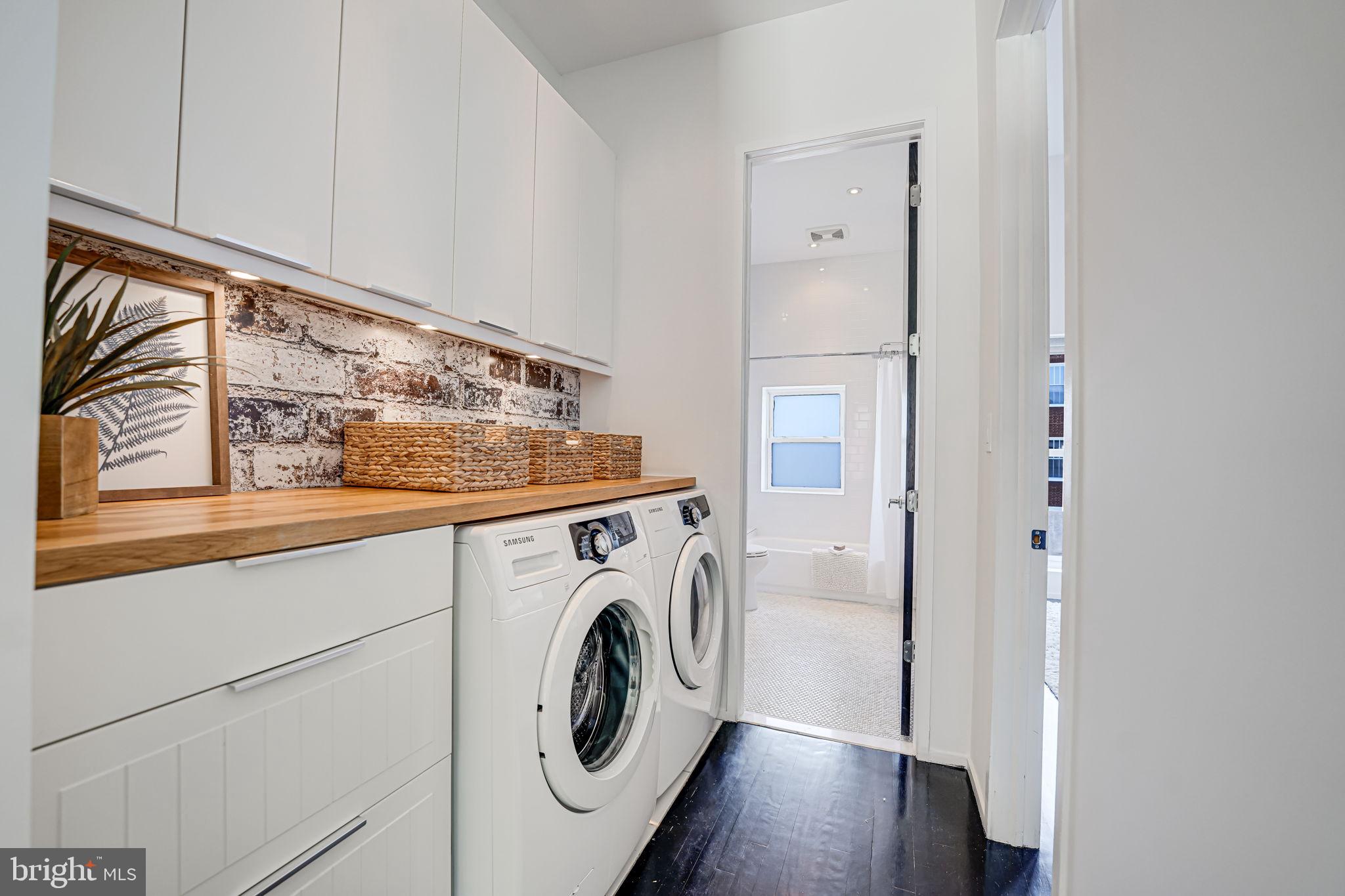 1836 9th Street Northwest, Unit 2 Washington, DC 20001 - Photo 28 of 30 a utility room with dryer and washer
