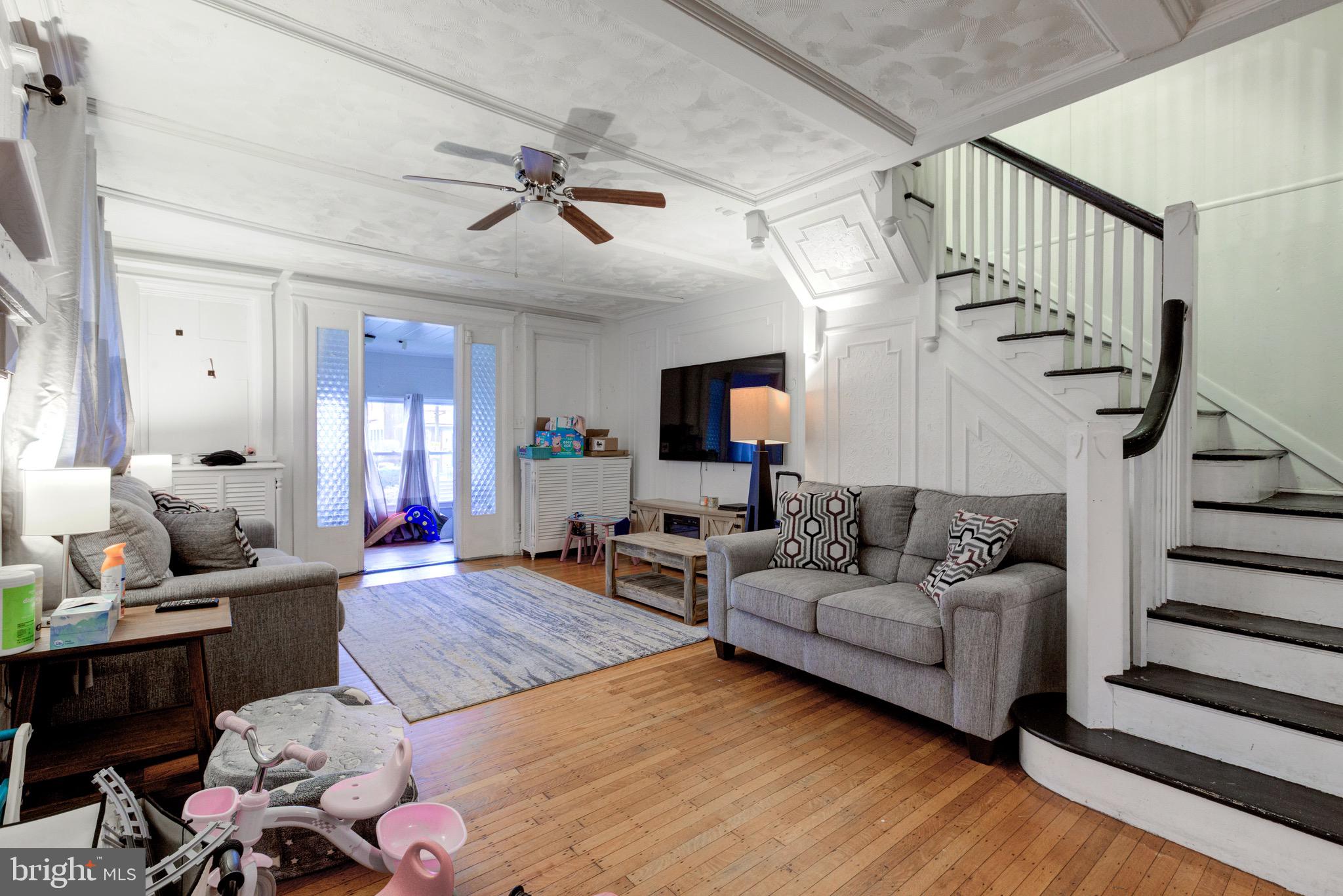 6209 Carpenter Street Philadelphia, PA 19143 - Photo 11 of 44 a living room with furniture and wooden floor