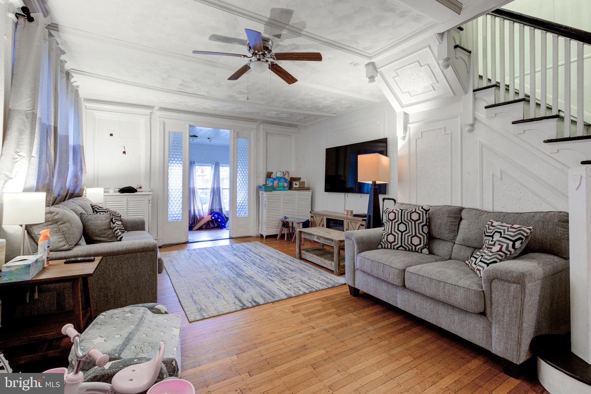 6209 Carpenter Street Philadelphia, PA 19143 - Photo 12 of 44 a living room with furniture and a wooden floor
