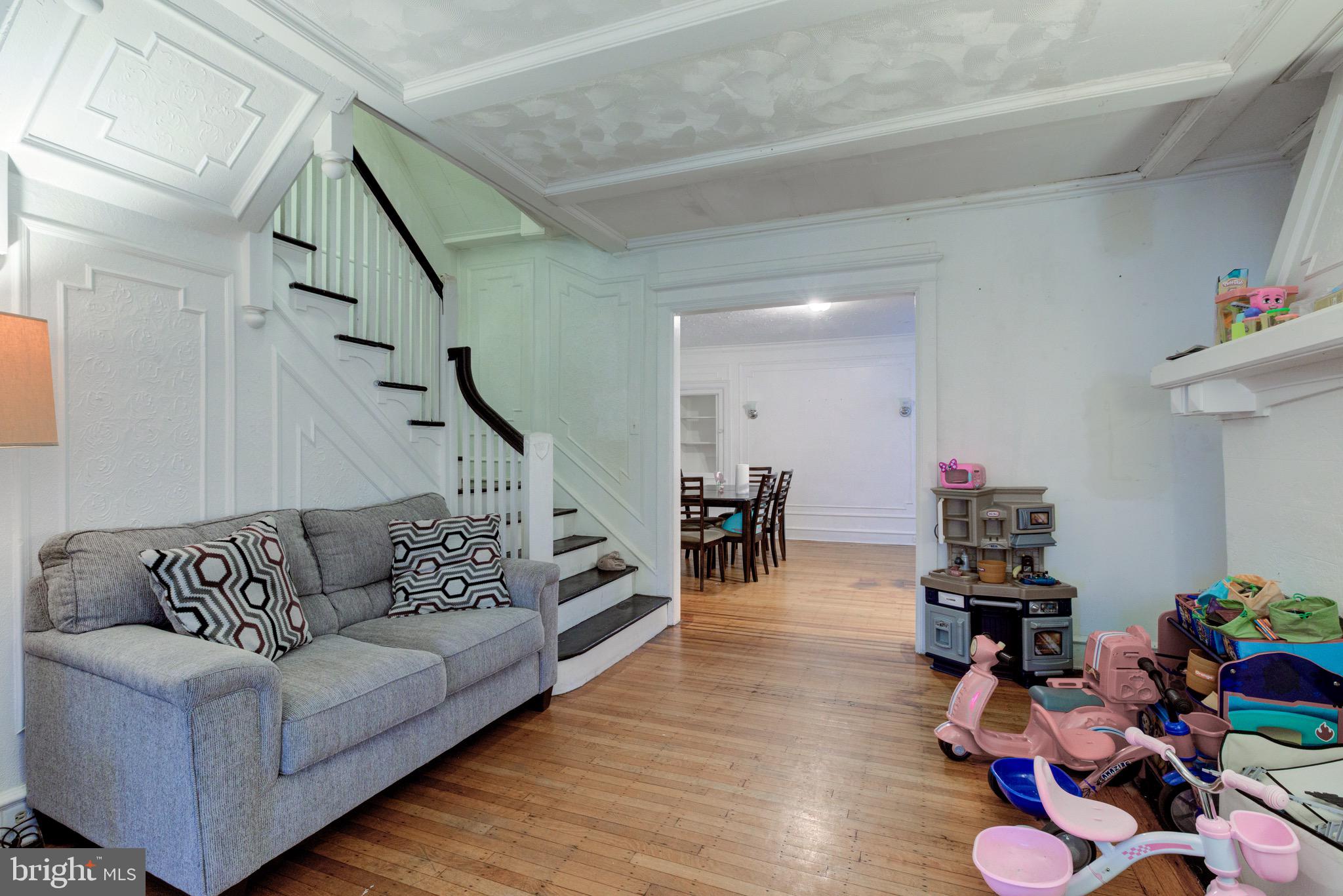 6209 Carpenter Street Philadelphia, PA 19143 - Photo 13 of 44 a living room with furniture and wooden floor