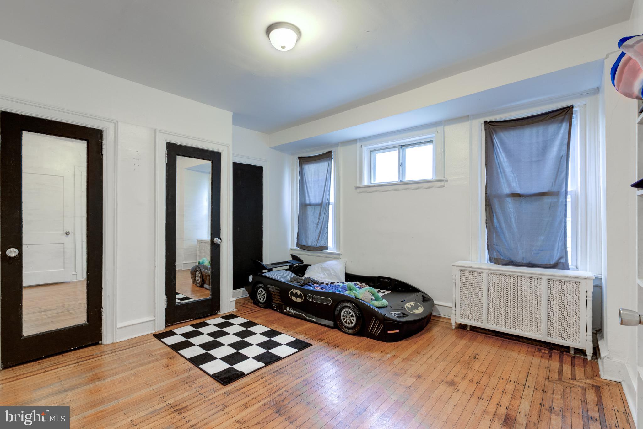 6209 Carpenter Street Philadelphia, PA 19143 - Photo 29 of 44 a bedroom with furniture and window
