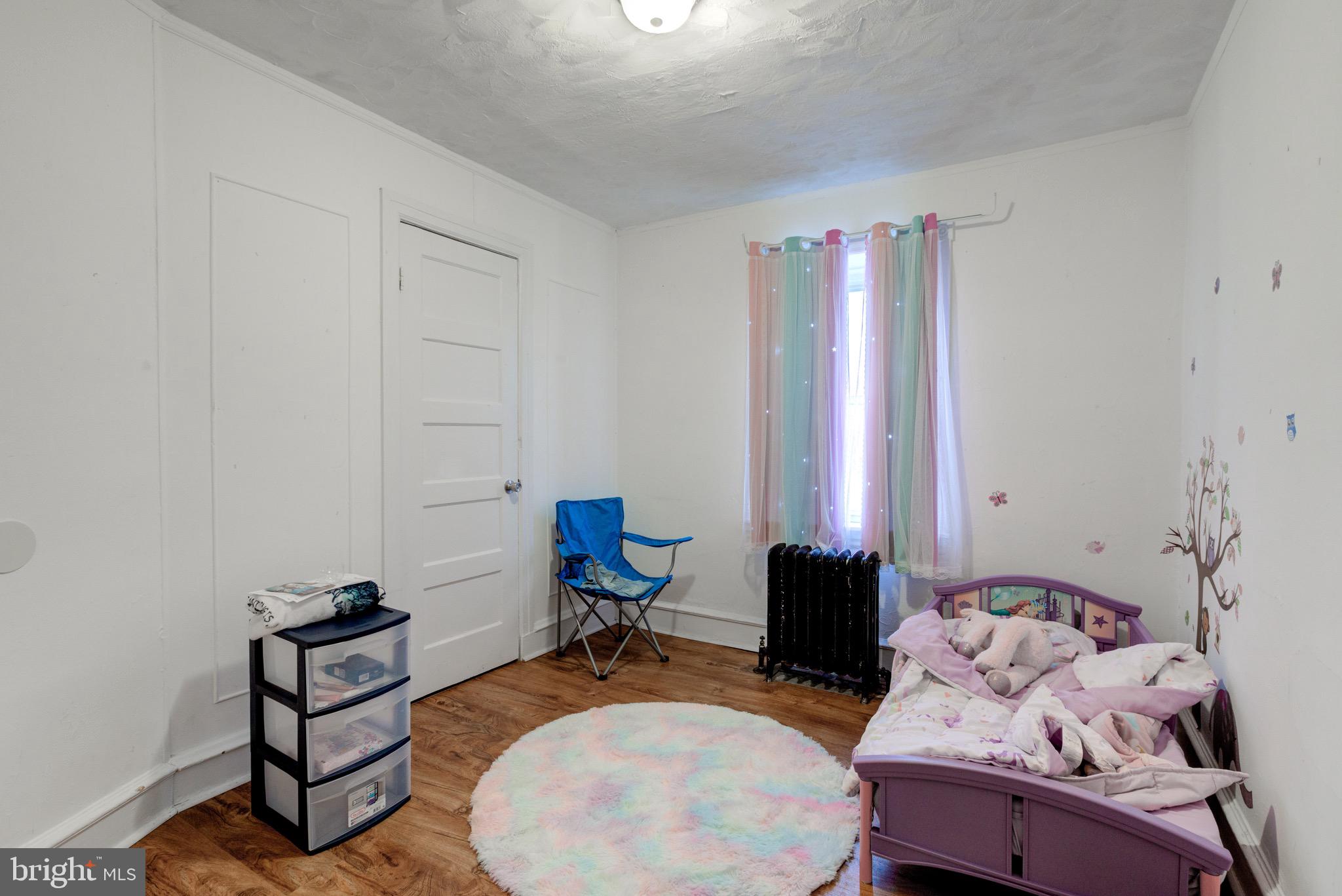6209 Carpenter Street Philadelphia, PA 19143 - Photo 37 of 44 a room with furniture and a window
