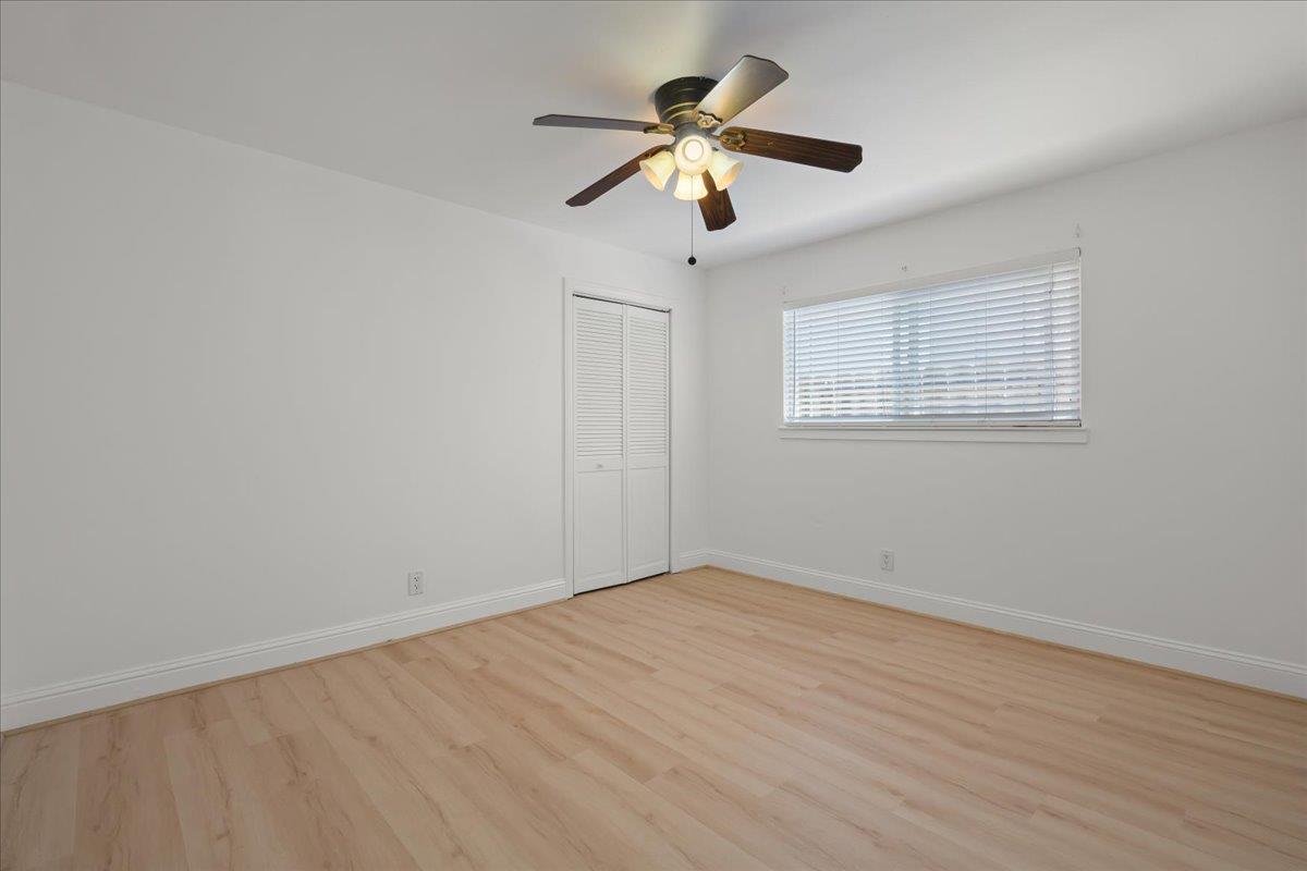 1610 Soto Street Seaside, CA 93955 - Photo 12 of 20 wooden floor in an empty room with a window