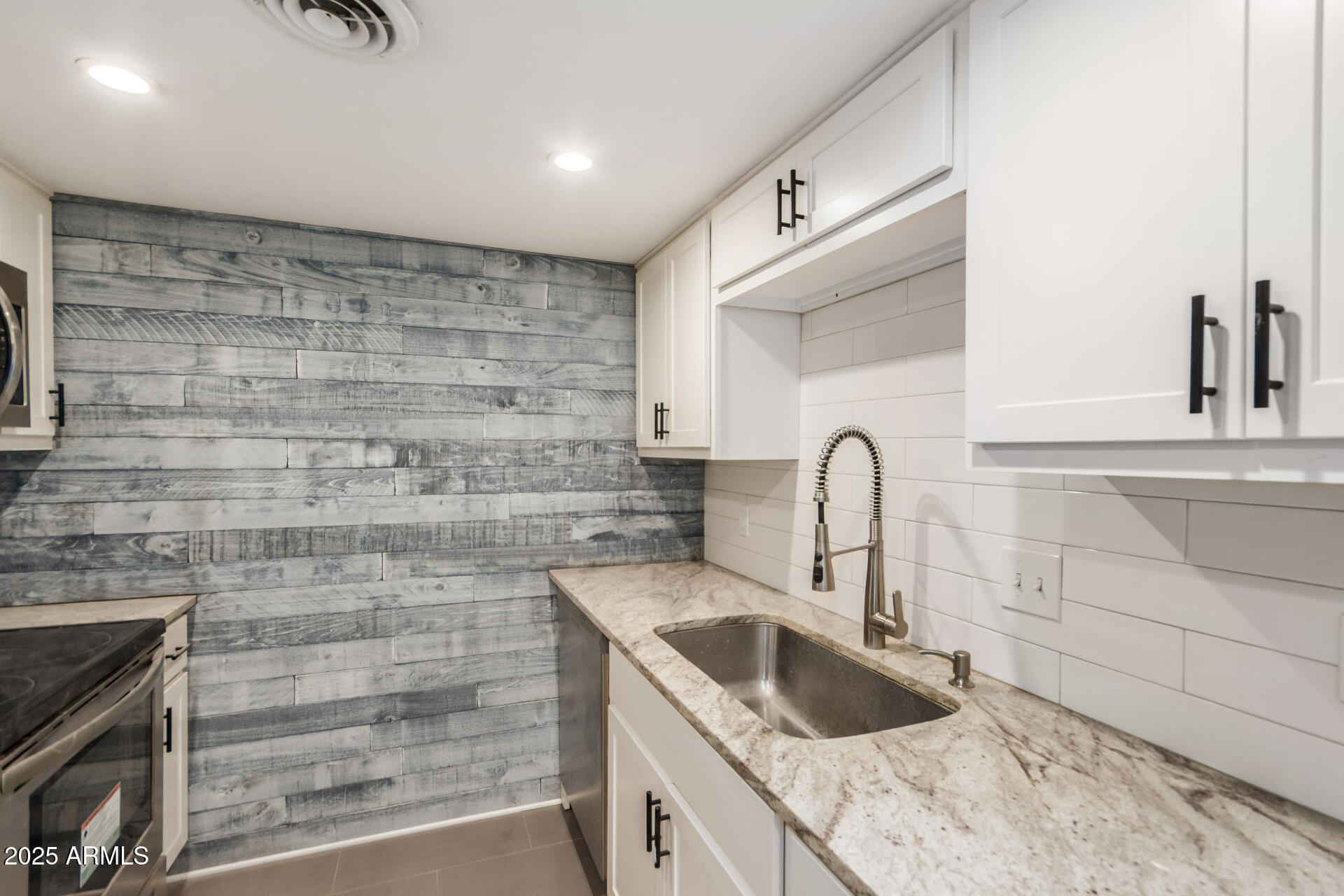 7126 North 19th Avenue, Unit 169 Phoenix, AZ 85021 - Photo 11 of 30 a close view of sink and tap