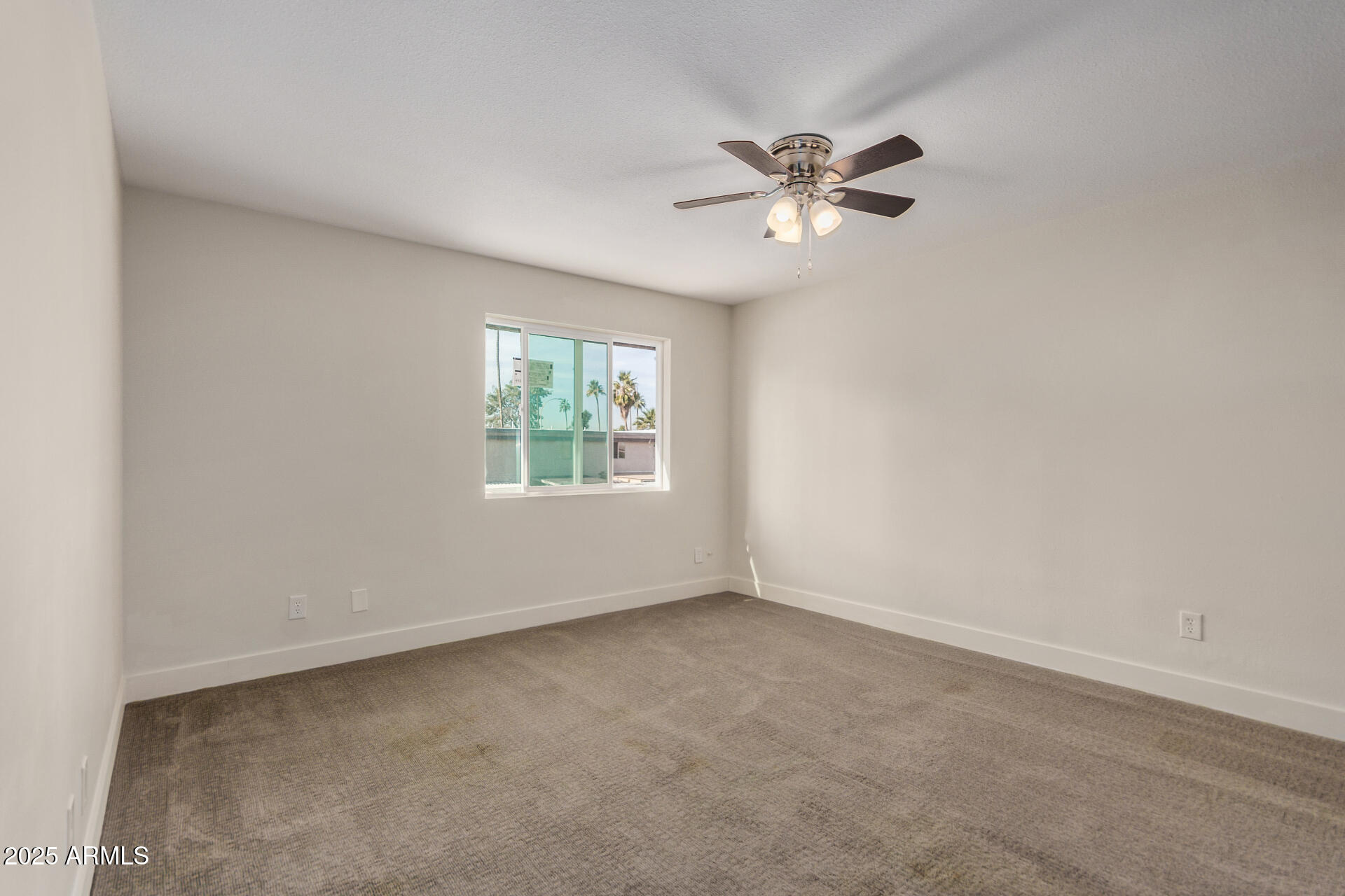 7126 North 19th Avenue, Unit 169 Phoenix, AZ 85021 - Photo 12 of 30 a view of an empty room with a window