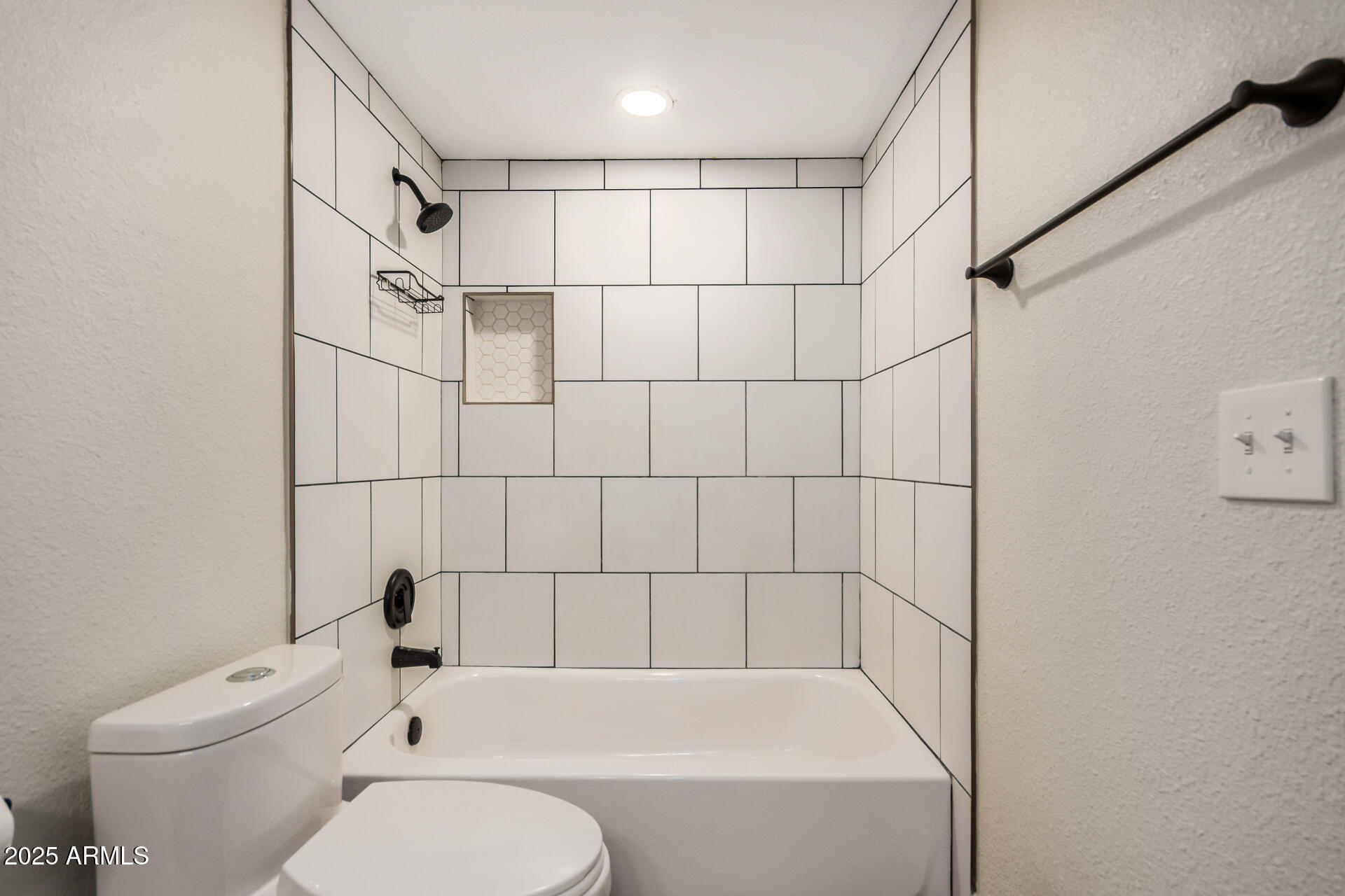 7126 North 19th Avenue, Unit 169 Phoenix, AZ 85021 - Photo 17 of 30 a bathroom with a toilet and shower