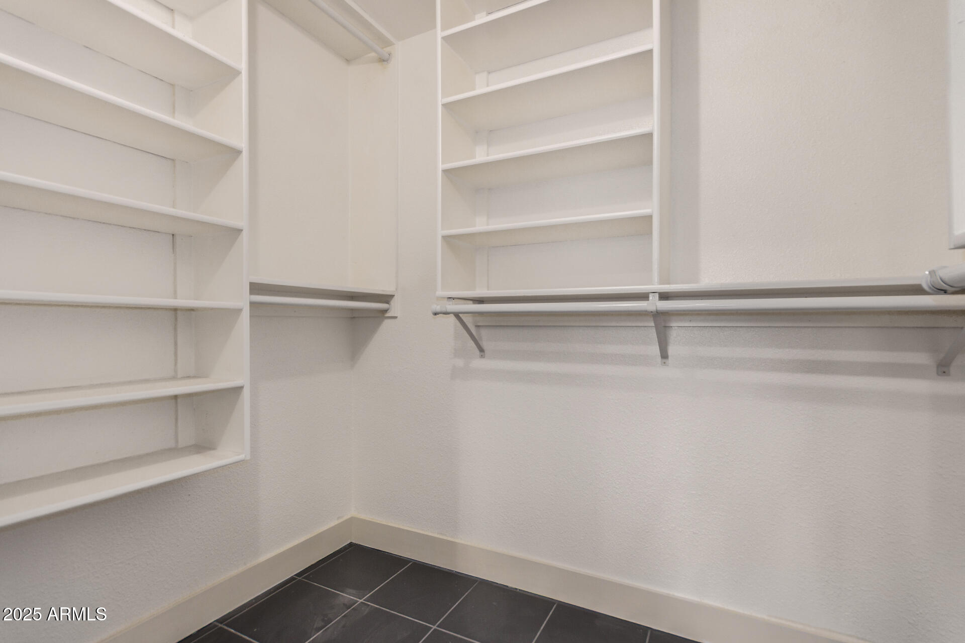 7126 North 19th Avenue, Unit 169 Phoenix, AZ 85021 - Photo 18 of 30 a view of an empty walk in closet