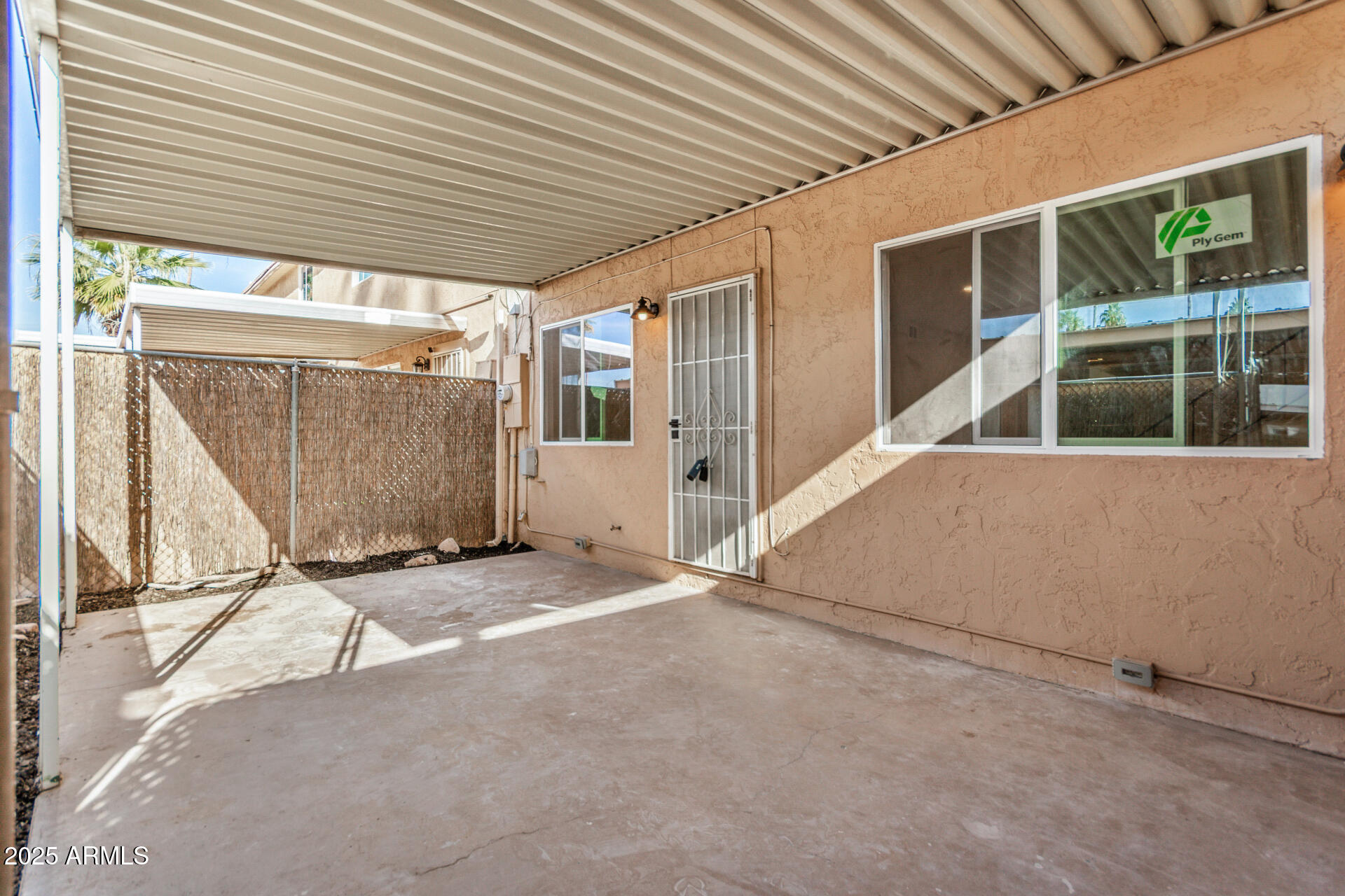 7126 North 19th Avenue, Unit 169 Phoenix, AZ 85021 - Photo 24 of 30 a view of backyard with large windows