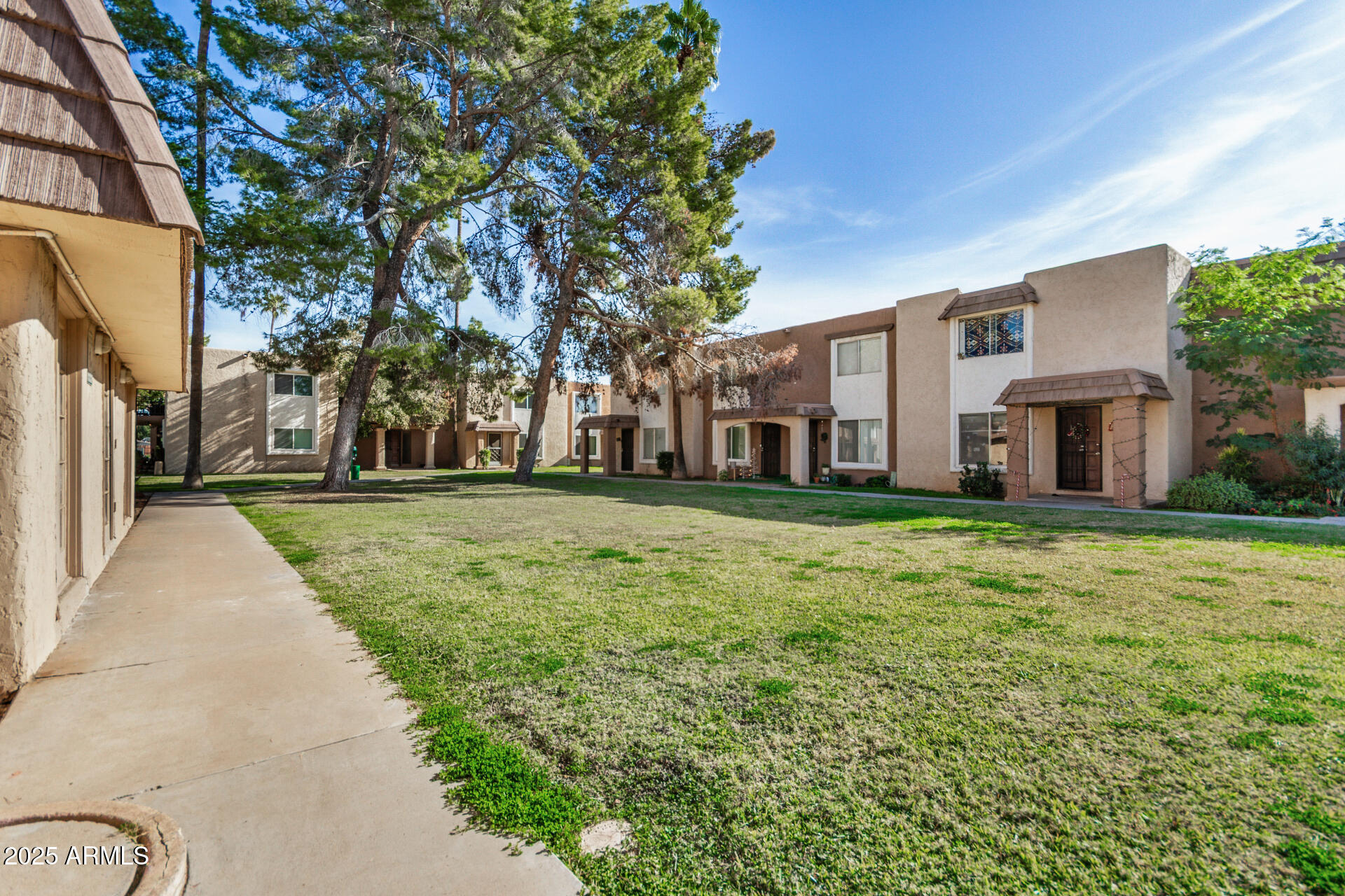 7126 North 19th Avenue, Unit 169 Phoenix, AZ 85021 - Photo 26 of 30 a house view with a garden space