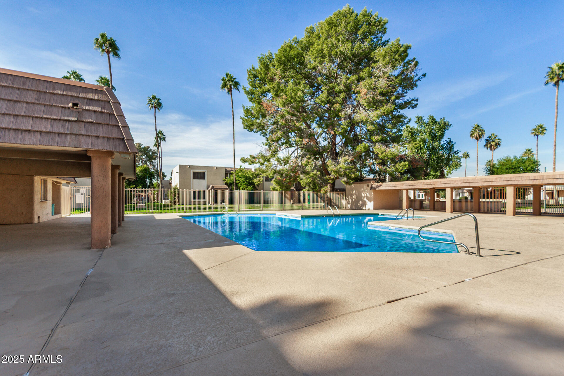 7126 North 19th Avenue, Unit 169 Phoenix, AZ 85021 - Photo 28 of 30 a view of a house with a swimming pool