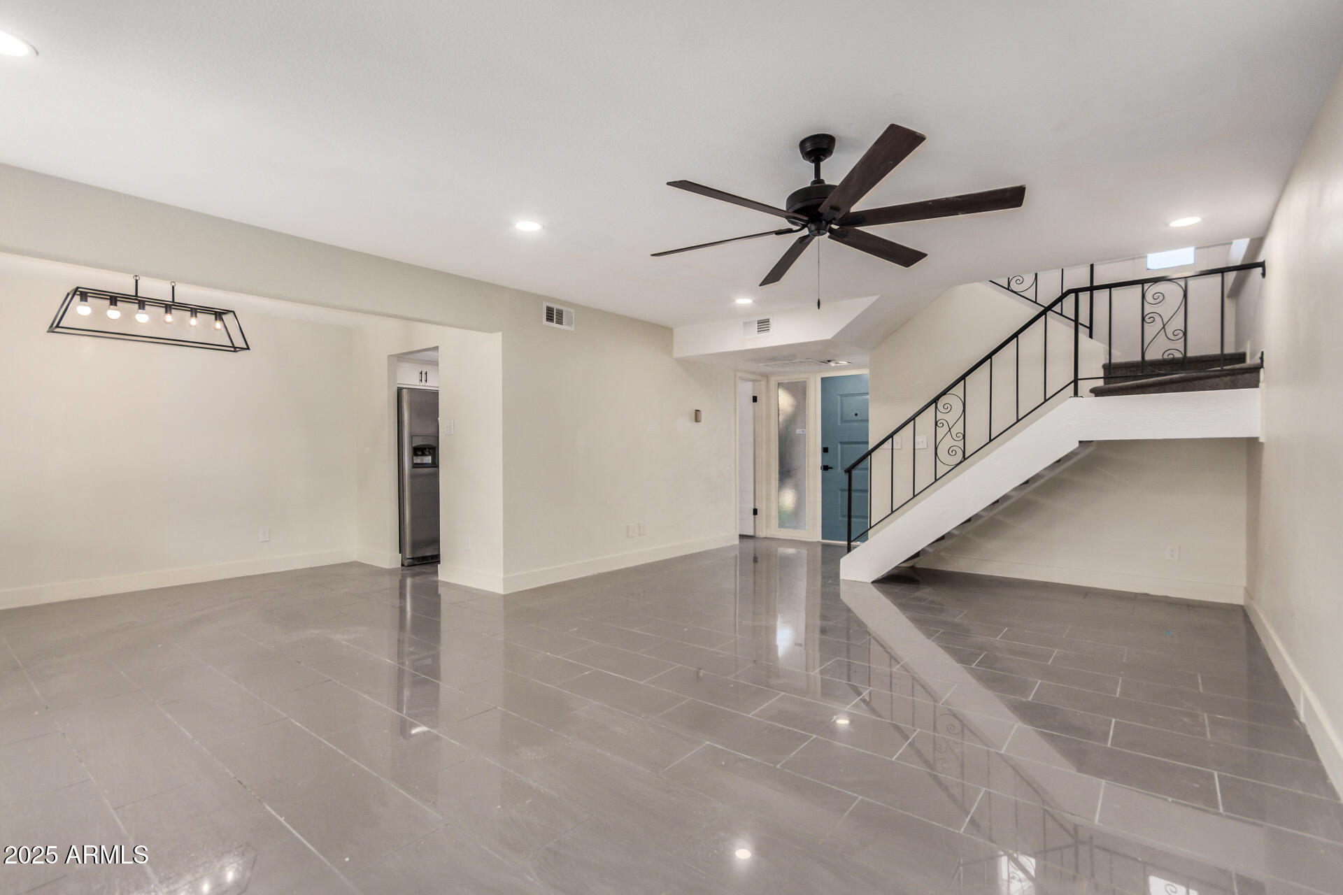 7126 North 19th Avenue, Unit 169 Phoenix, AZ 85021 - Photo 7 of 30 a view of an empty room with a window