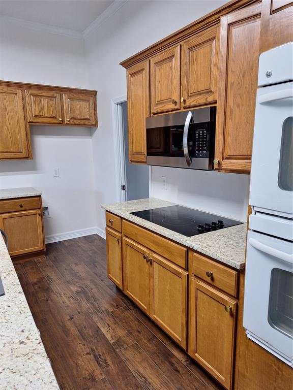 15280 Wynn School Road Hosston, LA 71043 - Photo 14 of 38 a kitchen with stainless steel appliances granite countertop a sink and a stove