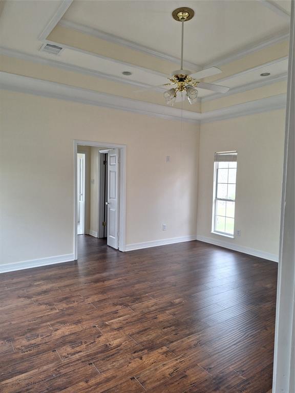 15280 Wynn School Road Hosston, LA 71043 - Photo 25 of 38 a view of empty room with wooden floor and fan