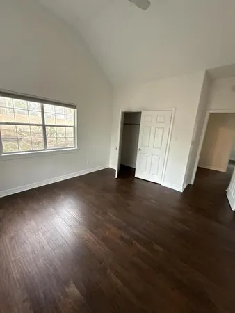 a bathroom with a sink a mirror and a toilet