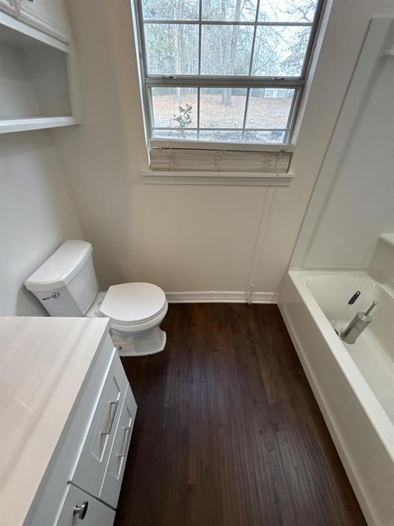 15280 Wynn School Road Hosston, LA 71043 - Photo 29 of 38 a bathroom with a sink and a toilet