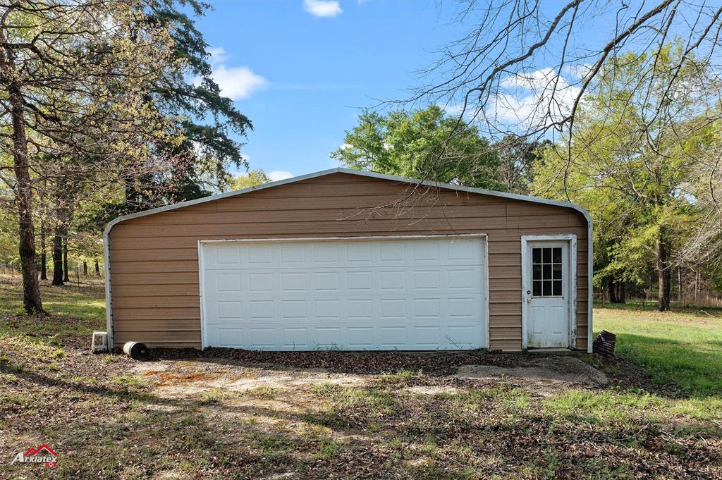 15280 Wynn School Road Hosston, LA 71043 - Photo 31 of 38 a backyard of a house