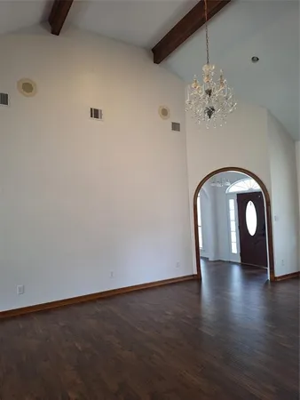 a view of a livingroom with wooden floor