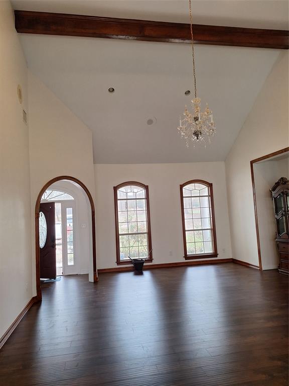15280 Wynn School Road Hosston, LA 71043 - Photo 7 of 38 a view of an empty room with wooden floor and windows
