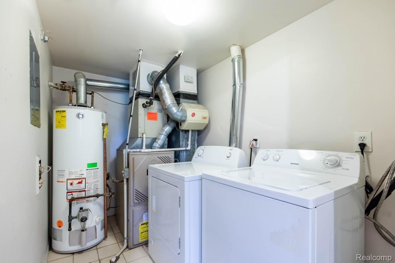 27334 Evergreen Road, Unit 21 Southfield, MI 48076 - Photo 16 of 20 Laundry room with in unit furnace and hot water heater