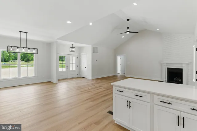 a spacious bathroom with a double vanity sink and a mirror