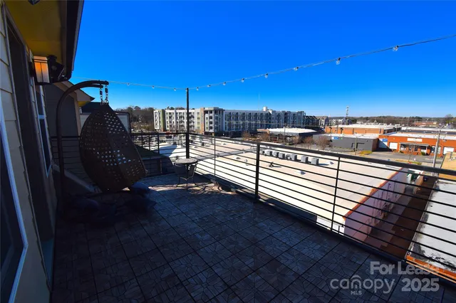 a view of a chairs and table on the wooden floor