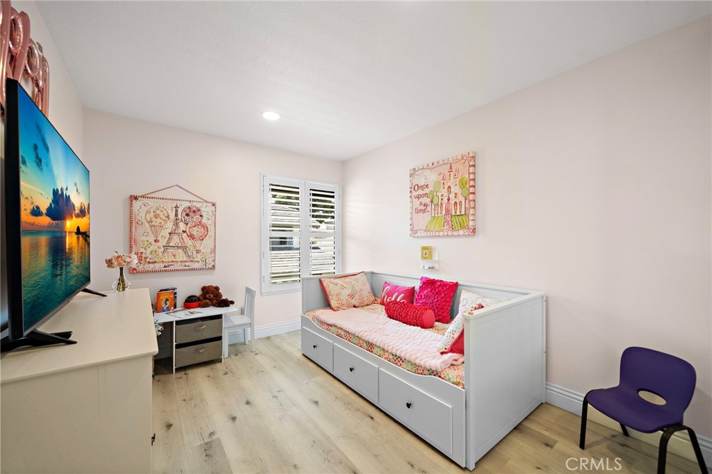 18134 Rustic Court Fountain Valley, CA 92708 - Photo 26 of 40 Bedroom 2 mirrored closet doors w/ recessed lighting