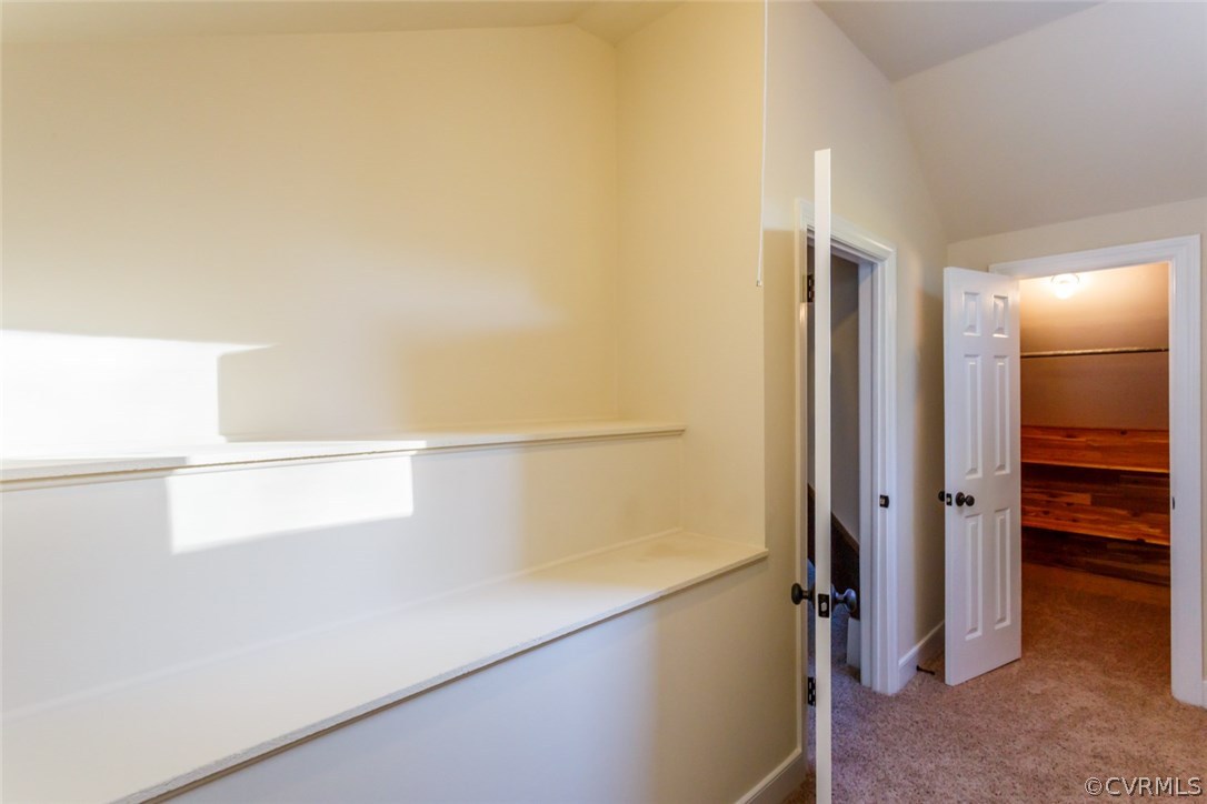 743 Grapevine Road Sandston, VA 23150 - Photo 40 of 50 Upstairs BR walk-in with custom shelving and secre