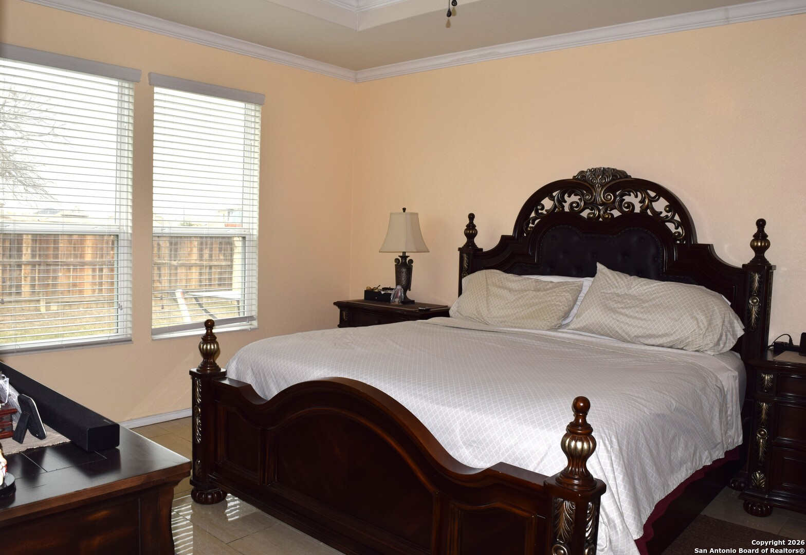 7215 Capricorn Way Converse, TX 78109 - Photo 12 of 22 a bedroom with a bed and a window
