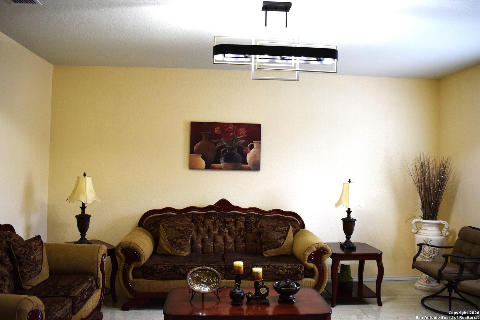 7215 Capricorn Way Converse, TX 78109 - Photo 15 of 22 a living room with furniture and a potted plant