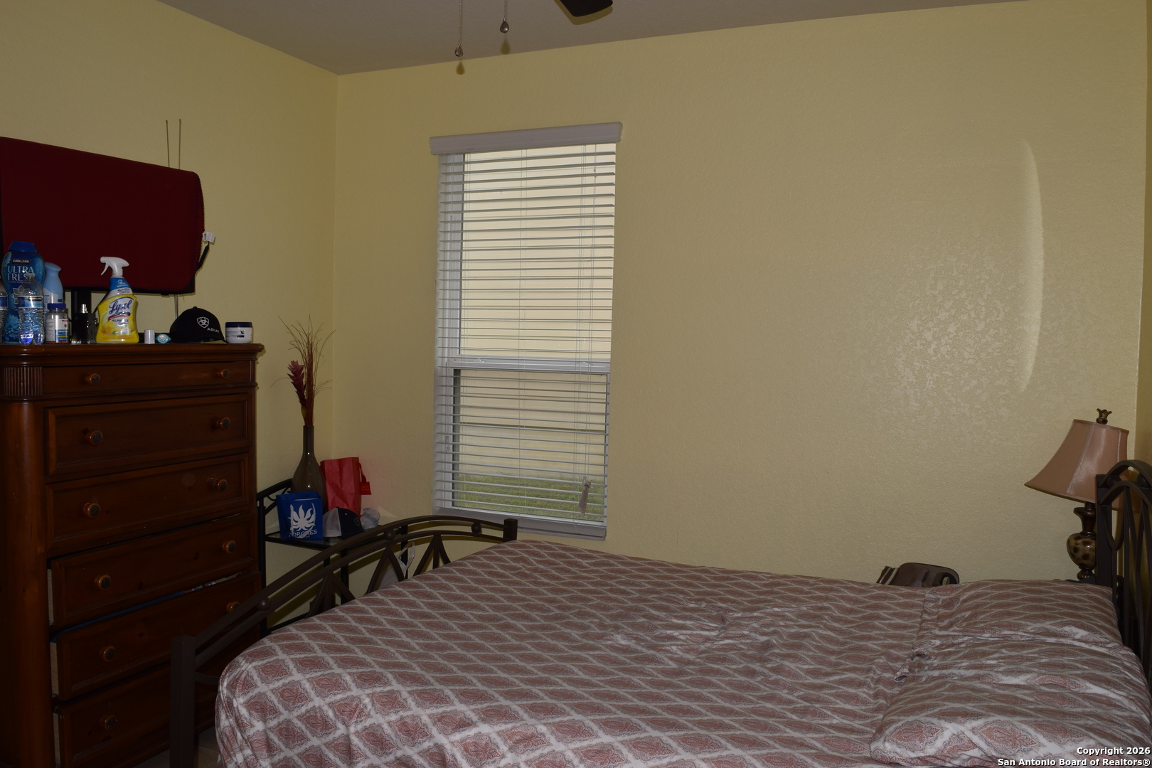 7215 Capricorn Way Converse, TX 78109 - Photo 18 of 22 a bedroom with a bed and a window
