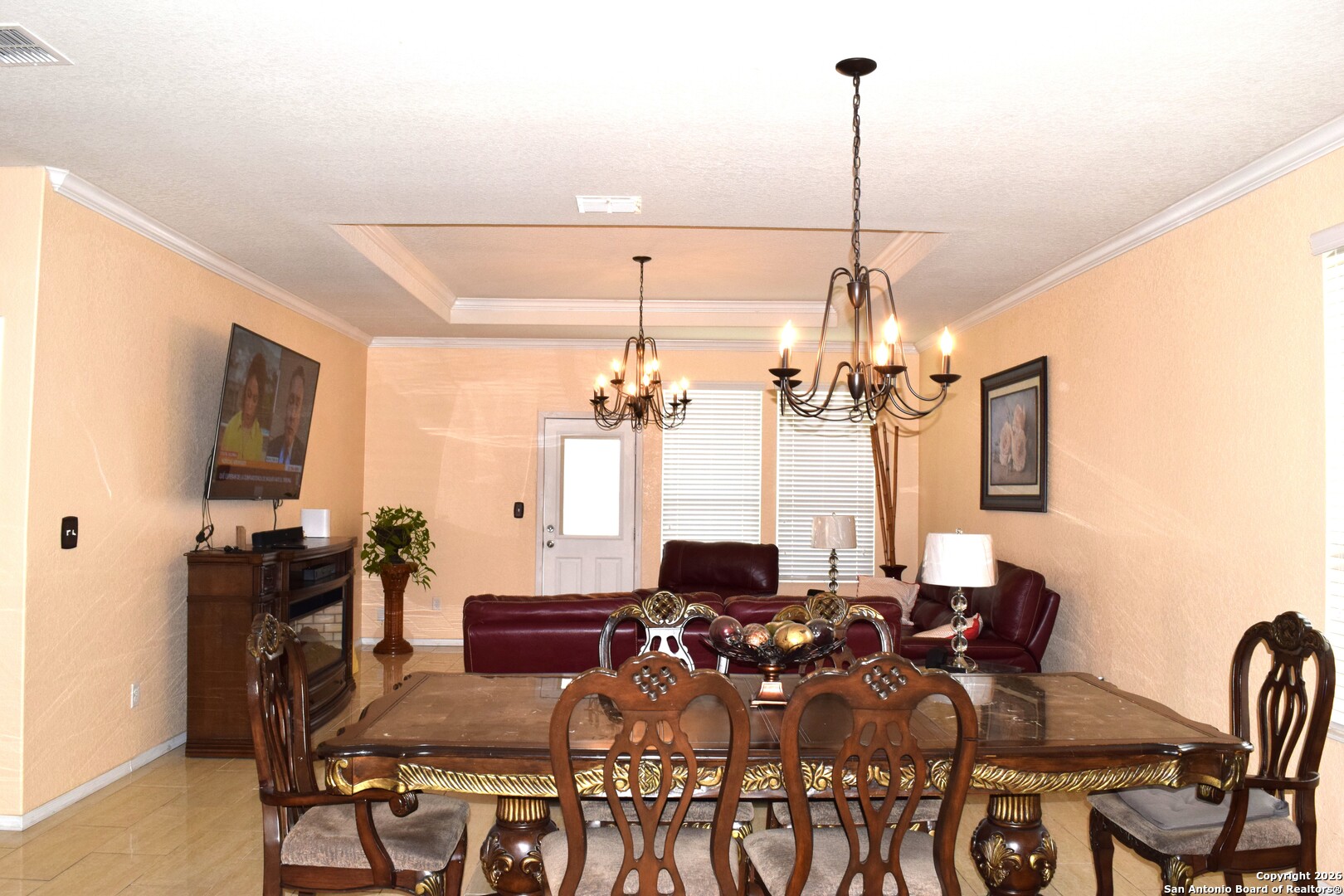 7215 Capricorn Way Converse, TX 78109 - Photo 4 of 22 a view of a dining room with furniture window and wooden floor