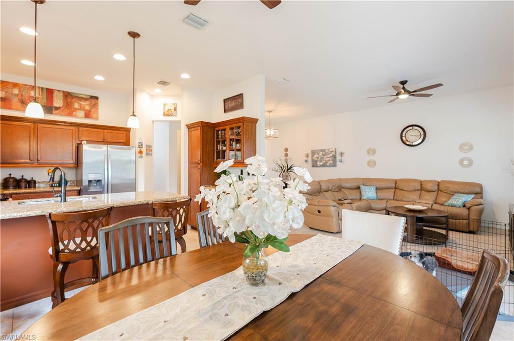 5092 Beckton Road Ave Maria, FL 34142 - Photo 6 of 36 a living room with furniture and a large window