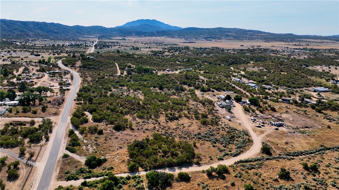 1 Wagon Wheel Road Anza, CA 92539 - Photo 14 of 31 an aerial view of house with yard and mountain view in back