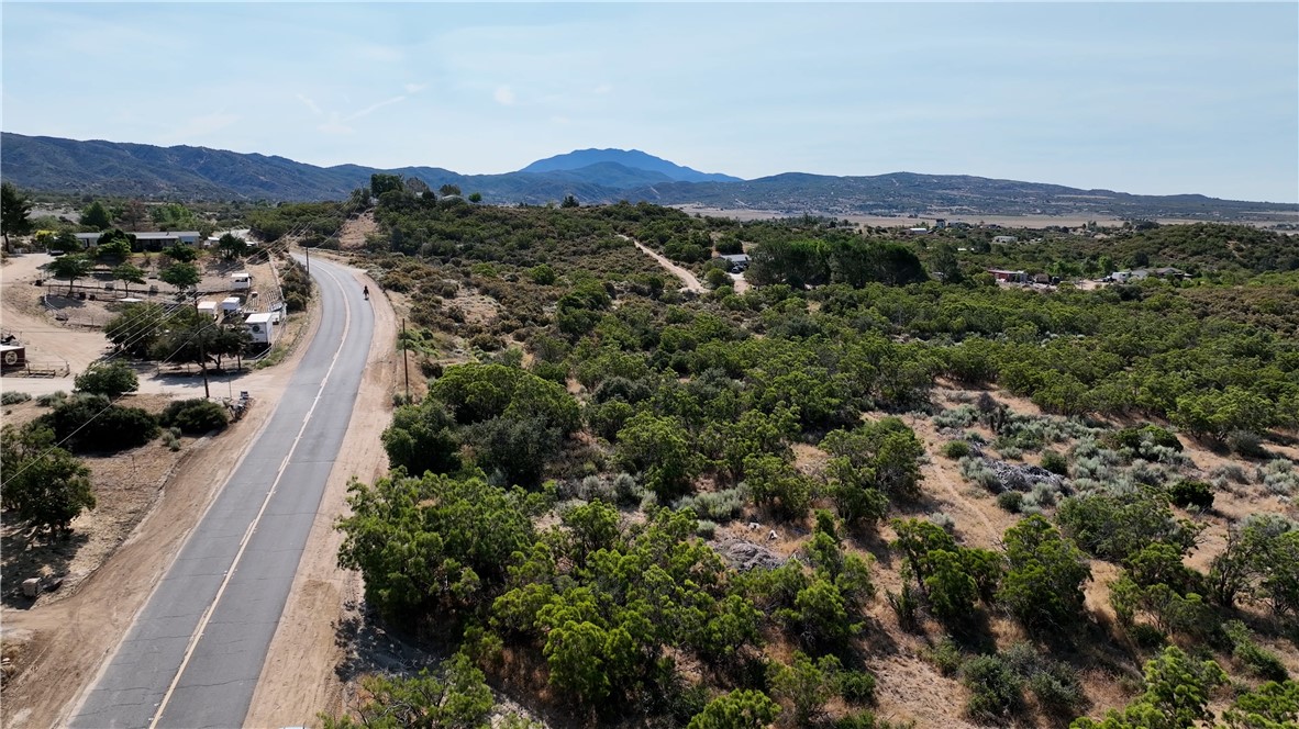 1 Wagon Wheel Road Anza, CA 92539 - Photo 6 of 31 a view of a city with a mountain