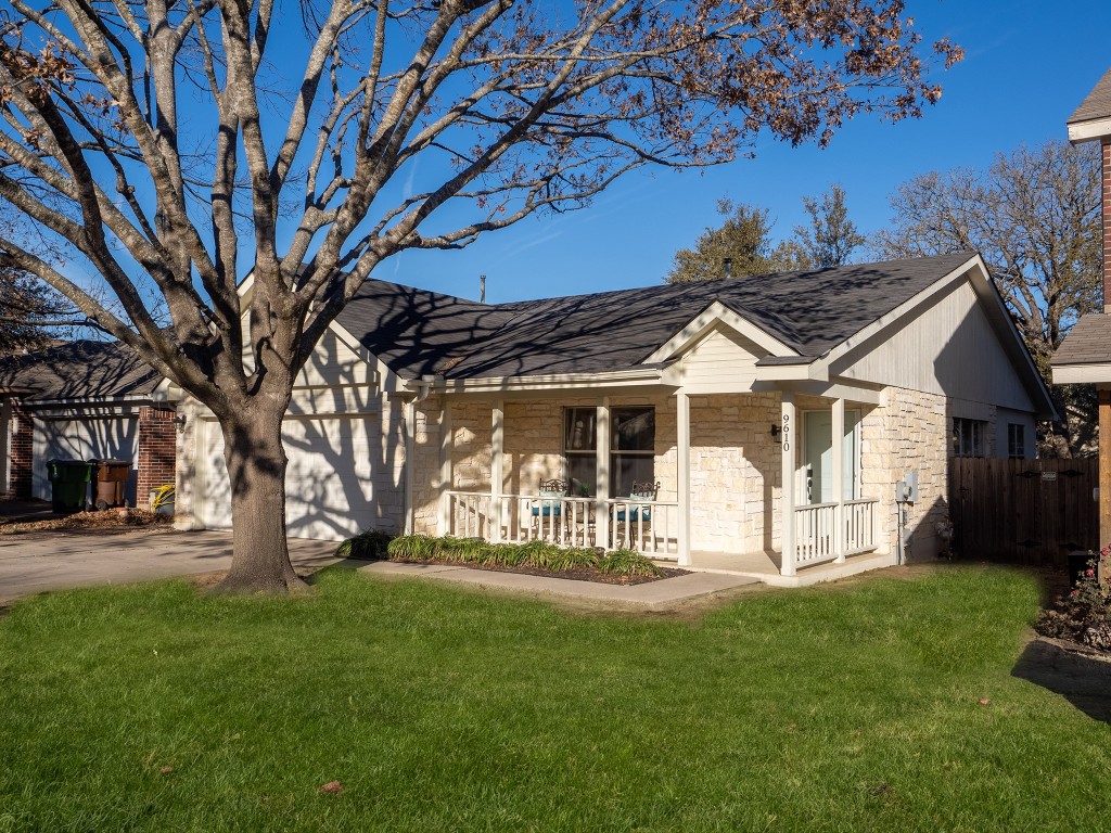 9610 Dalewood Drive Austin, TX 78729 - Photo 2 of 27 a front view of a house with a yard