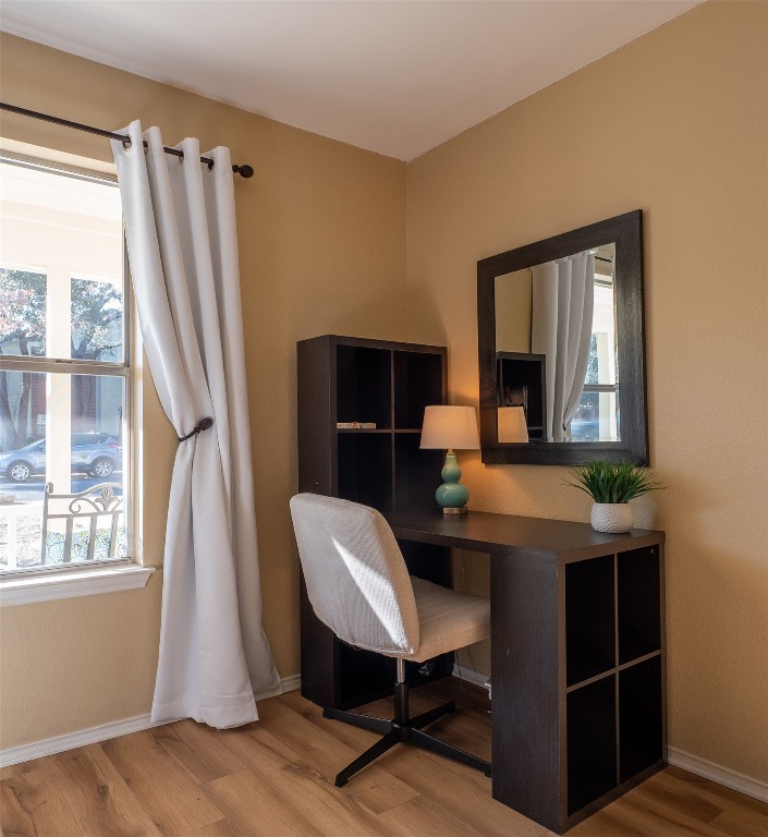 9610 Dalewood Drive Austin, TX 78729 - Photo 20 of 27 a view of a workspace with furniture and a window