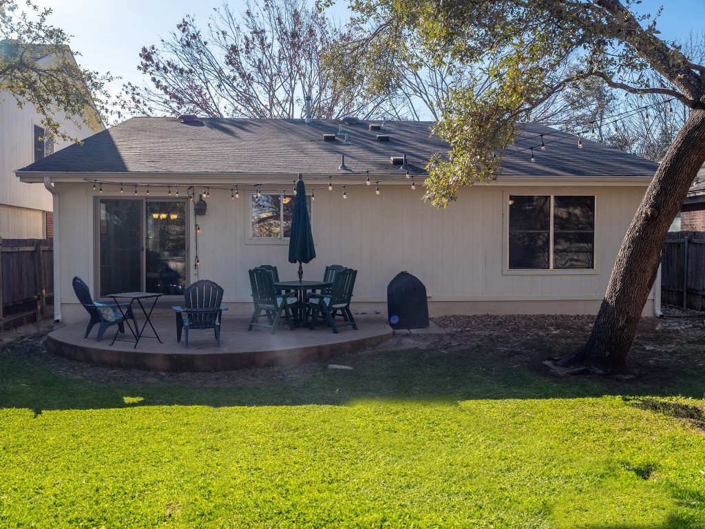 9610 Dalewood Drive Austin, TX 78729 - Photo 24 of 27 a view of a house with pool and chairs