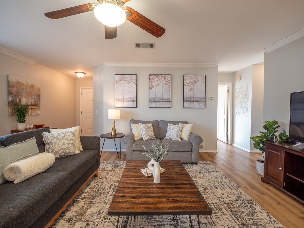 9610 Dalewood Drive Austin, TX 78729 - Photo 4 of 27 a living room with furniture and a rug