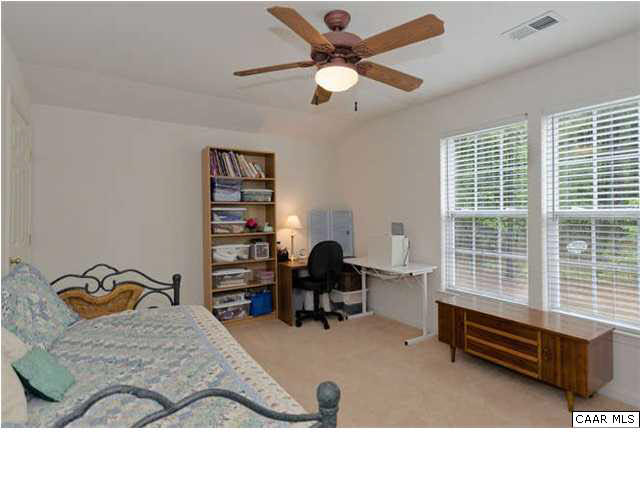 1200 Willow Ridge Road Troy, VA 22974 - Photo 21 of 33 a living room with furniture a window and a chandelier