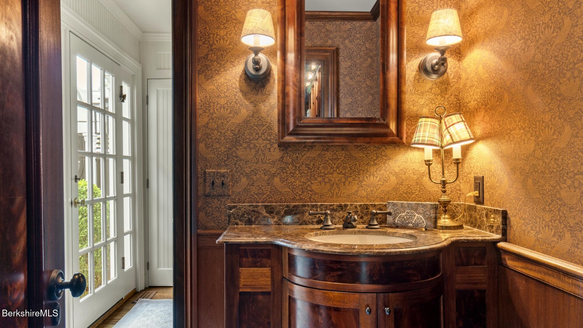 2650 Swamp Road Richmond, MA 01254 - Photo 14 of 49 a bathroom with a sink and a mirror