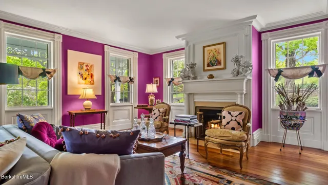 a living room with furniture and window