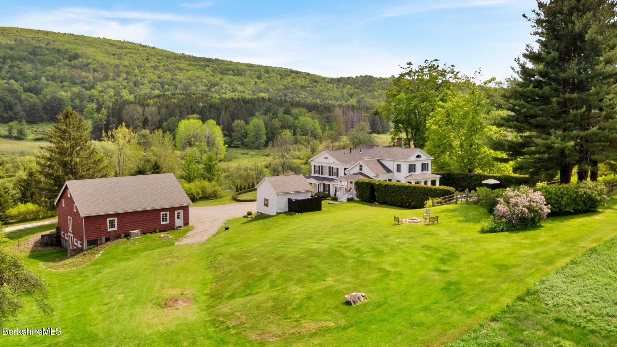 2650 Swamp Road Richmond, MA 01254 - Photo 2 of 49 a aerial view of a house with pool and a yard